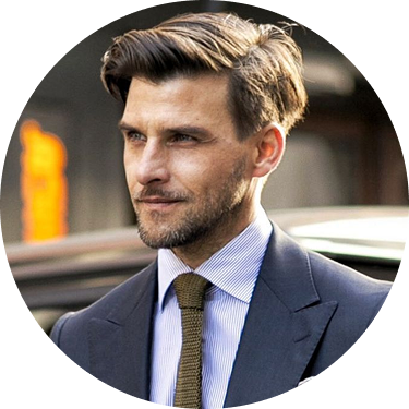 A smiling businesswoman with short brown hair